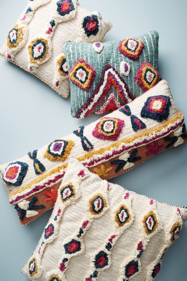 Decorative long cushions with a tribal design