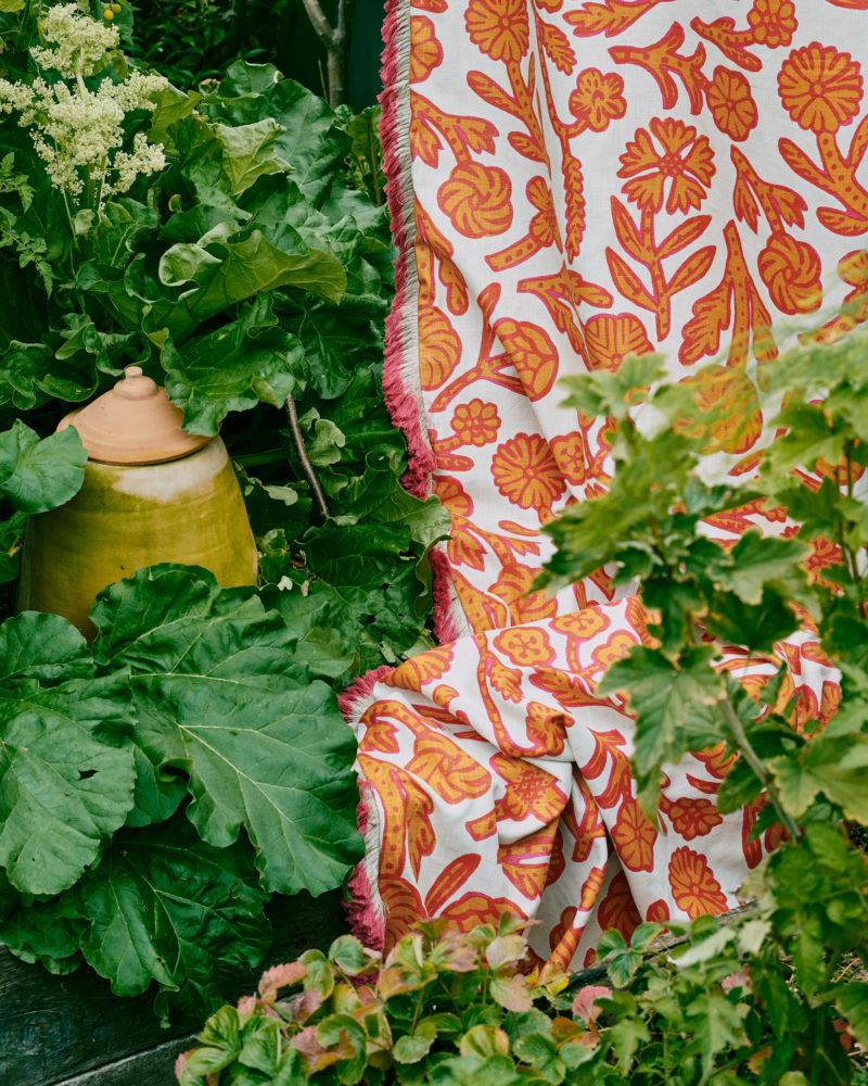 Patterned fabric orange and hot pink colour