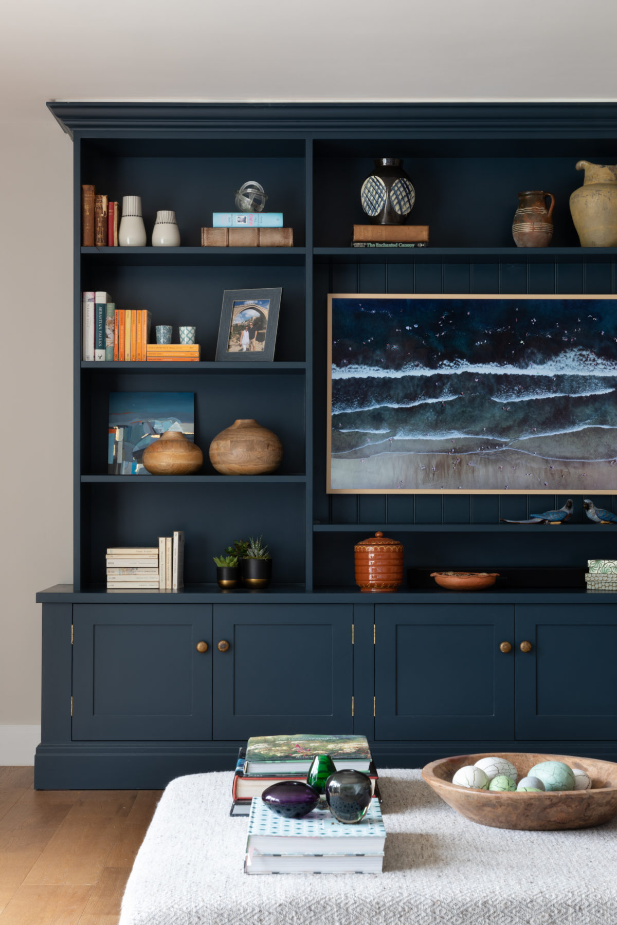 Hague blue bookcase with TV and styled shelves