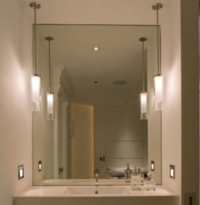 Bathroom pendant lights to sides of a mirror