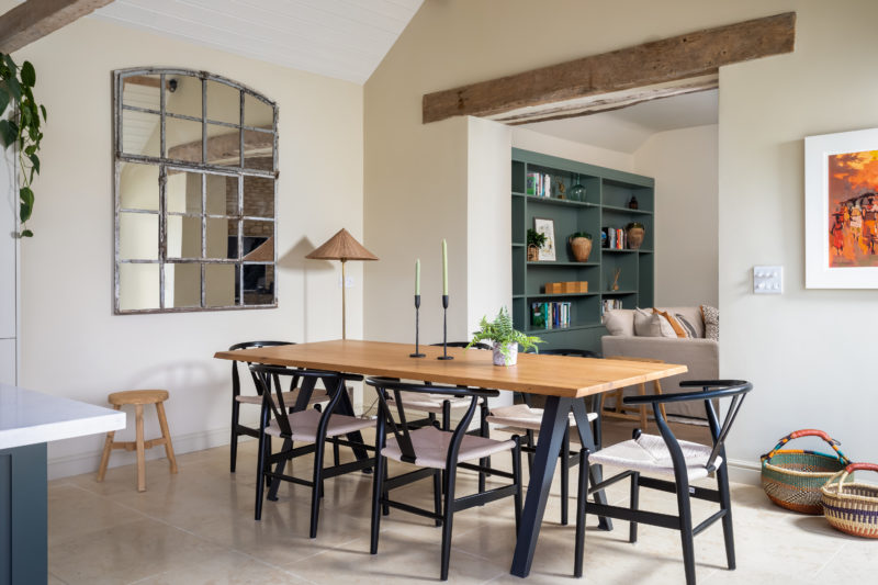Contemporary wood dining table & wishbone dining chairs