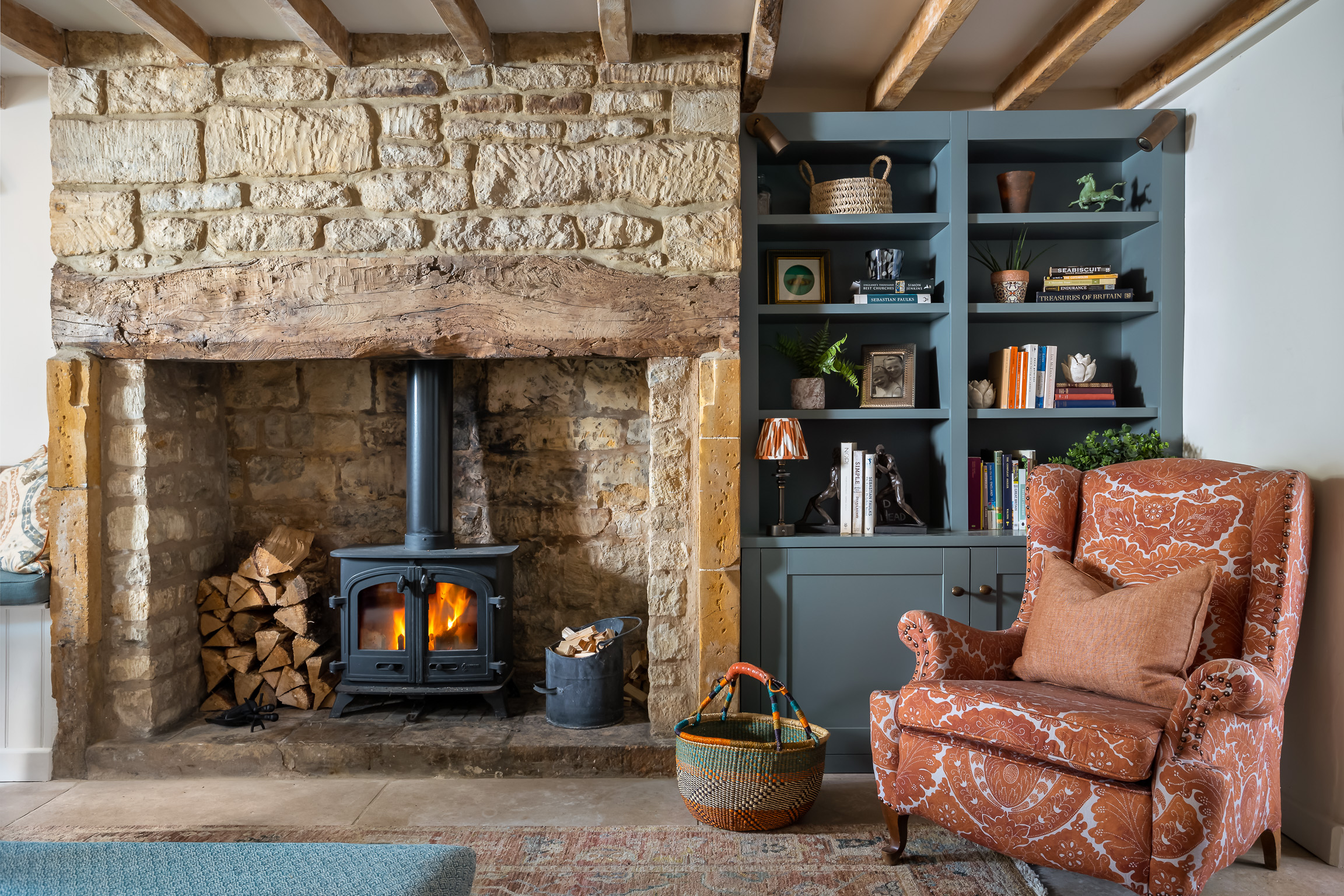 Living room with wood beams in Cotswold Cottage
